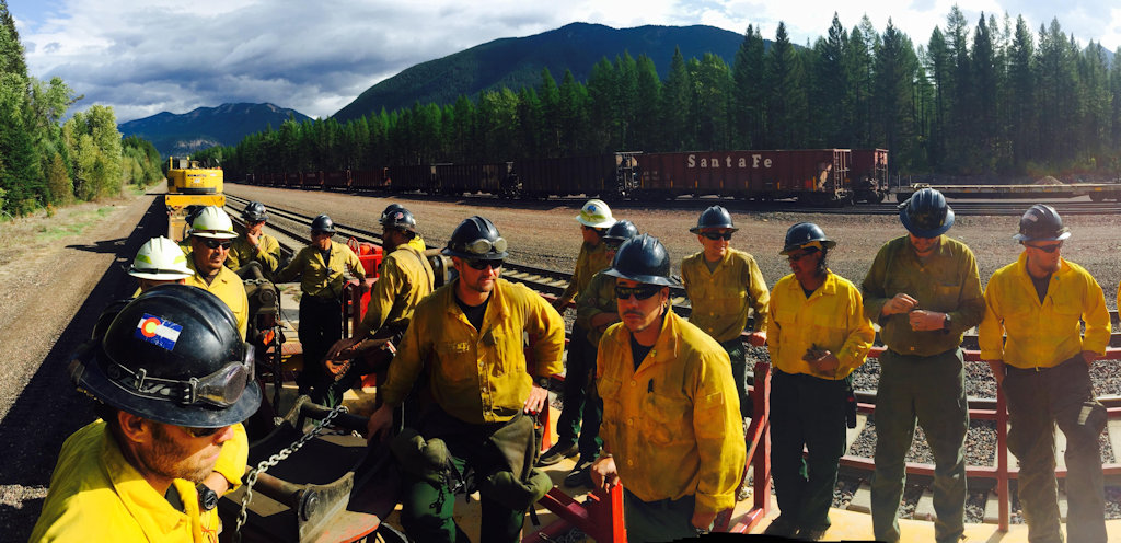 Thompson-Divide Complex Firefighters work on the tracks near Essex MT, Sep 1, 2015