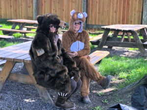 Bears Zoë Zardis and Jennifer Pentrack entertained participants at Polebridge Bear Smart training session, May 24, 2023 - photo by Suzanne Hildner